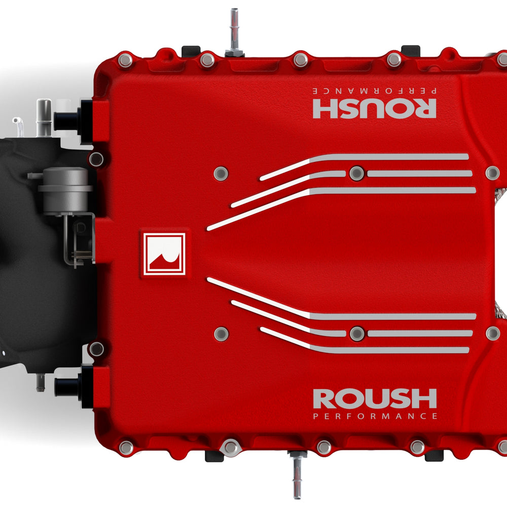 
                  
                    A red, rectangular engine component labeled "ROUSH Performance" with multiple metal bolts and fixtures, featuring a powerful supercharger that transforms any Roush Mustang into an 810 HP beast.
                  
                